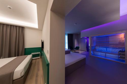 Smart Hotel Napoliにあるベッド