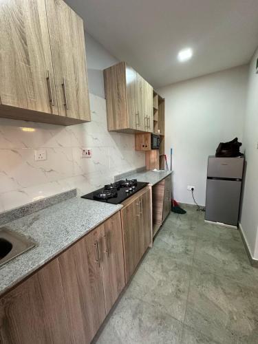 Η κουζίνα ή μικρή κουζίνα στο House27 Homes