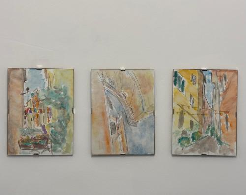 a group of four paintings hanging on a wall at Il Vicolo, 200m dal centro storico, 25 min da Roma in Monterotondo