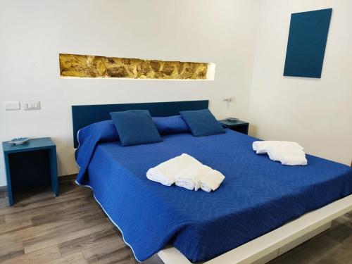 Postel nebo postele na pokoji v ubytování Casa Vacanze Mirò , Ravello