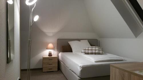 Postel nebo postele na pokoji v ubytování Hotel Bohlje