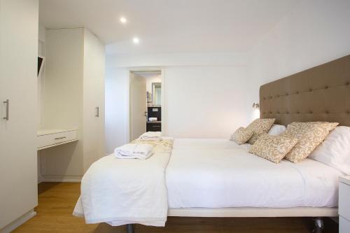 Cama o camas de una habitación en Hotel Cupidor