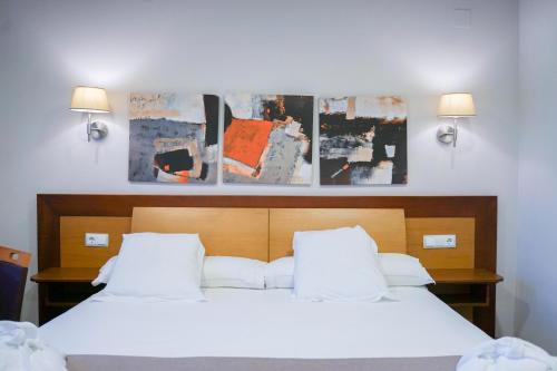 Ένα ή περισσότερα κρεβάτια σε δωμάτιο στο Salugral Termal Resort