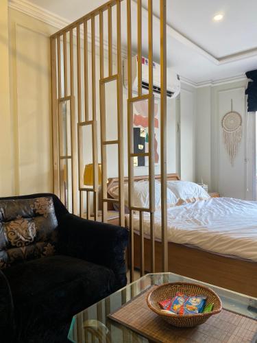 a living room with a bunk bed and a couch at Bohemian Studio Apt Bahria town Lahore in Rāmkot