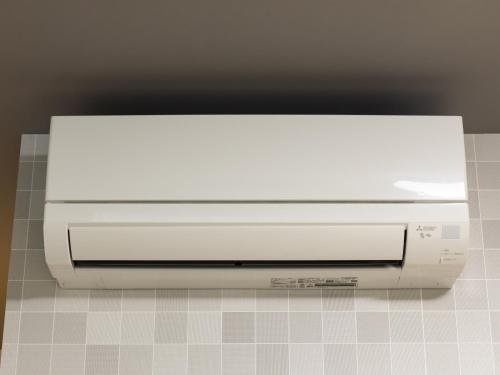 a white printer sitting on top of a wall at Kyoto Plaza Hotel Kintetsu Jujo in Kyoto