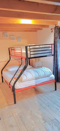 Ein Bett oder Betten in einem Zimmer der Unterkunft Gite de la ferme