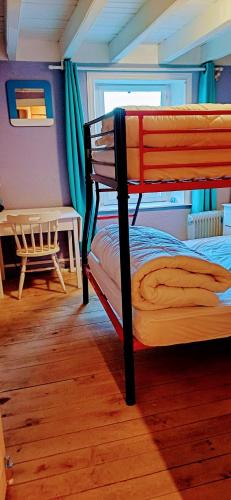 Ein Bett oder Betten in einem Zimmer der Unterkunft Gite de la ferme