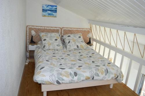 Ένα ή περισσότερα κρεβάτια σε δωμάτιο στο Appartement front de mer avec balcon vue Océan !