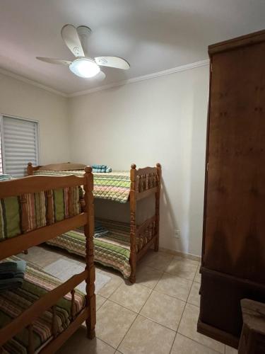 Postel nebo postele na pokoji v ubytování Apartamento Garça Branca - Itaguá