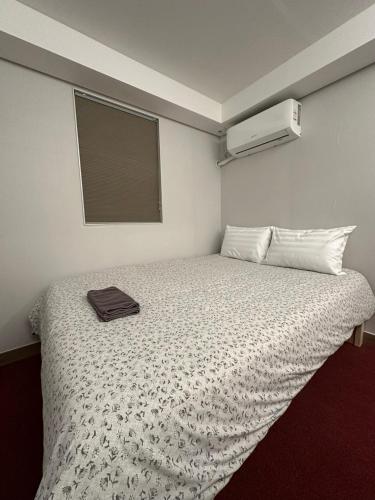 Katil atau katil-katil dalam bilik di Insadong R Guesthouse