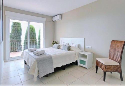 A bed or beds in a room at Luxury Villa at La Sella Resort