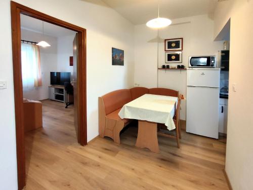 Kuchyň nebo kuchyňský kout v ubytování Apartment Carmen