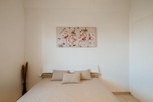 Ένα ή περισσότερα κρεβάτια σε δωμάτιο στο cozy apartment messini
