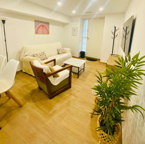 a living room with a couch and a table at San Fernando 33 in Córdoba