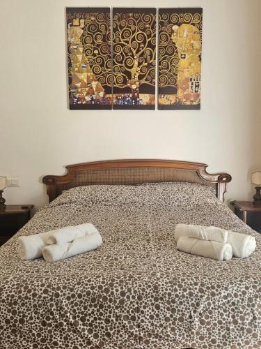 Ένα ή περισσότερα κρεβάτια σε δωμάτιο στο Casa Aida