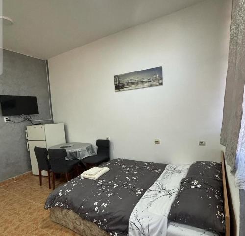 Una cama o camas en una habitación de Apartman Stil