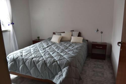 Postel nebo postele na pokoji v ubytování Casa Amapola