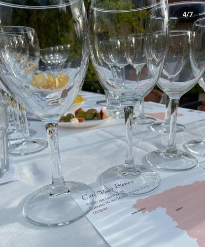 a group of wine glasses sitting on a table at Patio de las Flores in Riópar