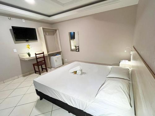 Postel nebo postele na pokoji v ubytování Lamour Hotel
