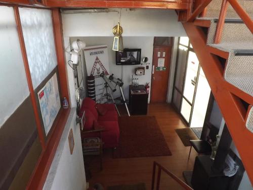 an overhead view of a living room with a red couch at Hotel Diaguitas Illapel in Illapel