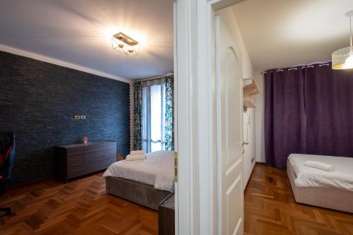 Ένα ή περισσότερα κρεβάτια σε δωμάτιο στο Villa Melanie
