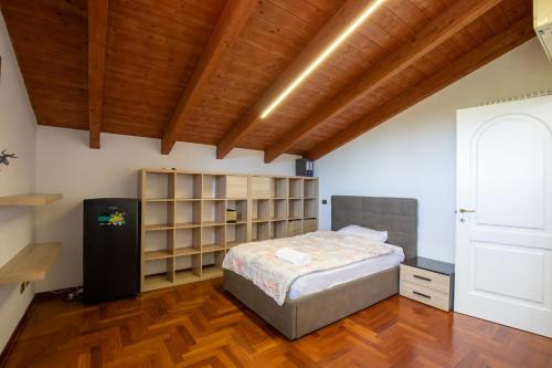 Ένα ή περισσότερα κρεβάτια σε δωμάτιο στο Villa Melanie