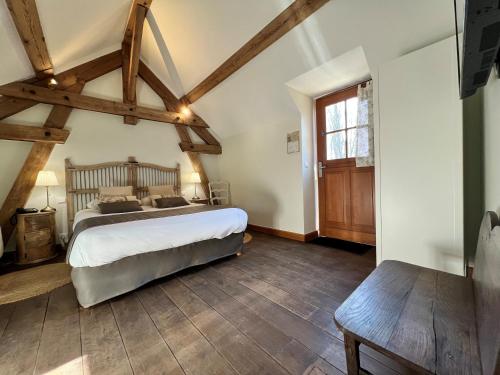 Postel nebo postele na pokoji v ubytování Château de Challanges