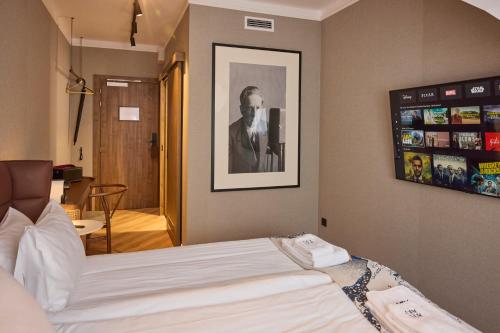Postel nebo postele na pokoji v ubytování Hotel Akureyri