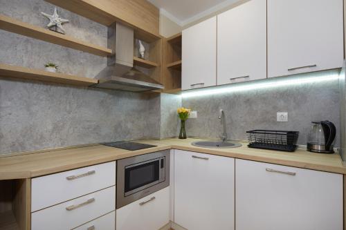 Dapur atau dapur kecil di Bellicity Apart Complex