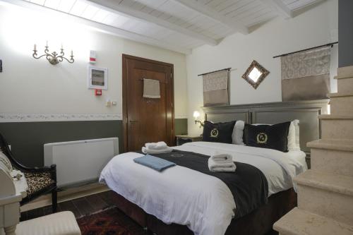Postel nebo postele na pokoji v ubytování Pindos Resort