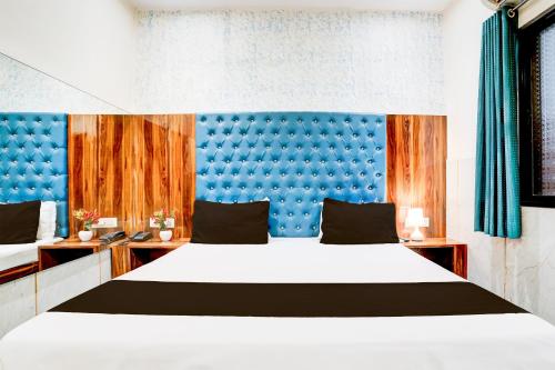 Voodi või voodid majutusasutuse Hotel O Shiv Sai Residency Lodging & Boarding toas