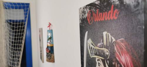 a book with a picture on the side of it at Casa Giusi in Sferracavallo