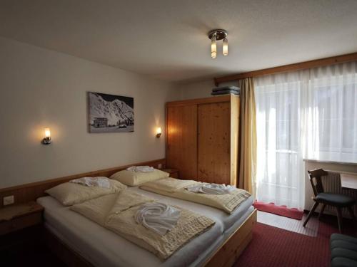 Ένα ή περισσότερα κρεβάτια σε δωμάτιο στο Bella Mira