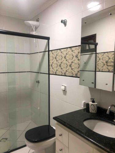 Ένα μπάνιο στο House for rent in Matinhos