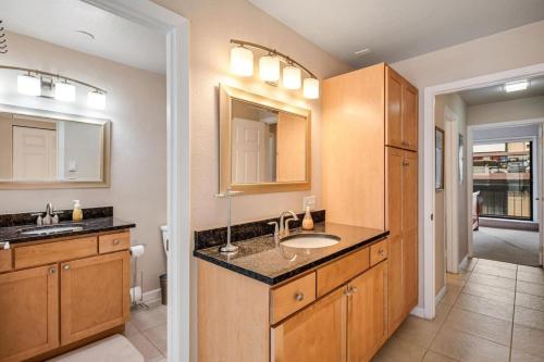 a bathroom with a sink and a mirror at Winter Getaway in the Rockies in Avon