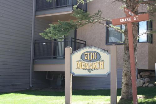 a sign in front of a building with a zoo sign at Gorgeous Aspen Condo By Lift Ski In out Parking in Aspen