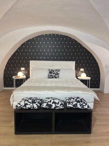 Een bed of bedden in een kamer bij VagaLuna Short Stay