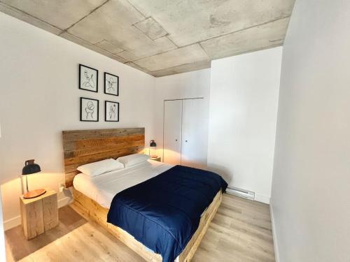 Voodi või voodid majutusasutuse Amazing loft in Montreal Old Port toas