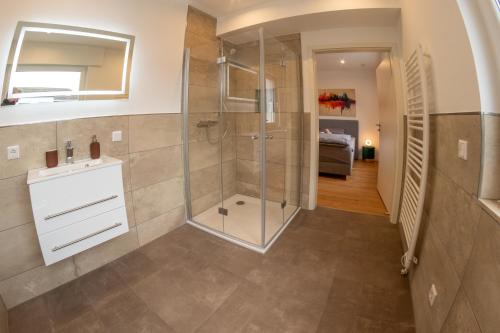 Ένα μπάνιο στο S-Rooms Zimmervermietung 1,2
