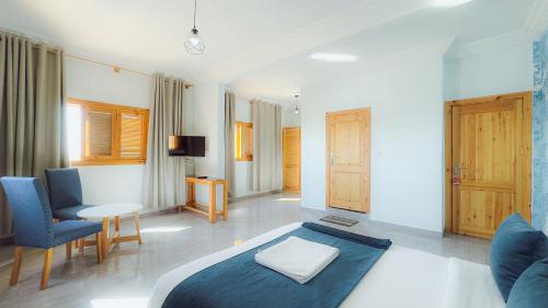 TV a/nebo společenská místnost v ubytování Fyndy Hotel Dakhla