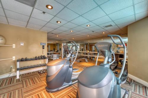 a fitness room with treadmills and ellipticals at Grand Lodge #151 in Crested Butte