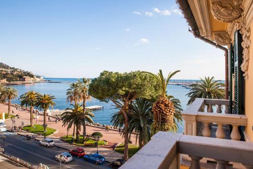 a view of the ocean from the balcony of a building at Hotel Vesuvio in Rapallo