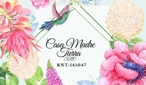 a floral watercolor frame with a bird and flowers at Casa Madre Tierra SRC in Santa Rosa de Cabal