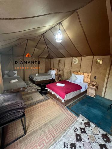 Postel nebo postele na pokoji v ubytování Diamante Luxury Camp