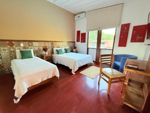 EcoHotel Vale do Solにあるベッド