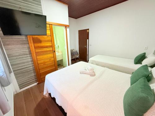 EcoHotel Vale do Solにあるベッド