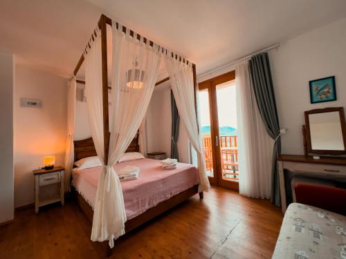 Postel nebo postele na pokoji v ubytování Alice Tatil Evi
