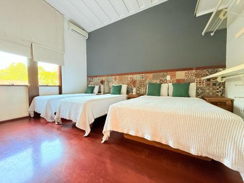 EcoHotel Vale do Solにあるベッド