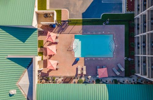 an overhead view of a swimming pool in a building at Hampton Inn Channel Islands Harbor in Oxnard