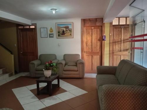 Khu vực ghế ngồi tại Julio Cesar HOTELES